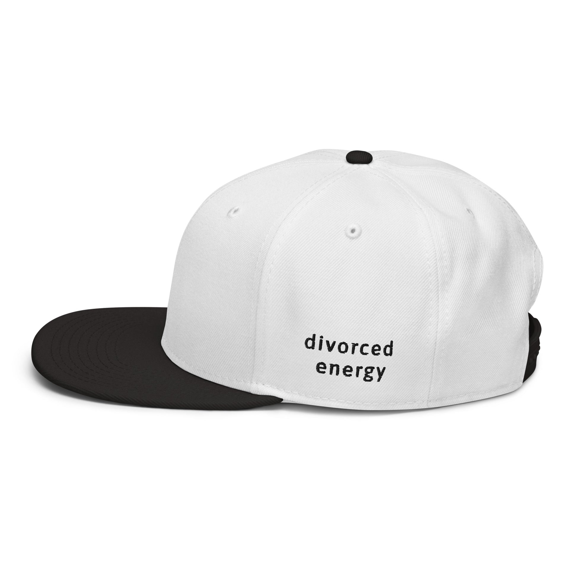 Side view of black and white snapback showing flat brim with Divorced Energy  embroidered in black