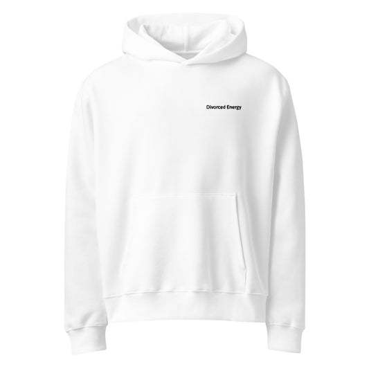 Front view of white pullover hoodie with hood and kangaroo pocket and divorced energy embroidered in black on left chest 