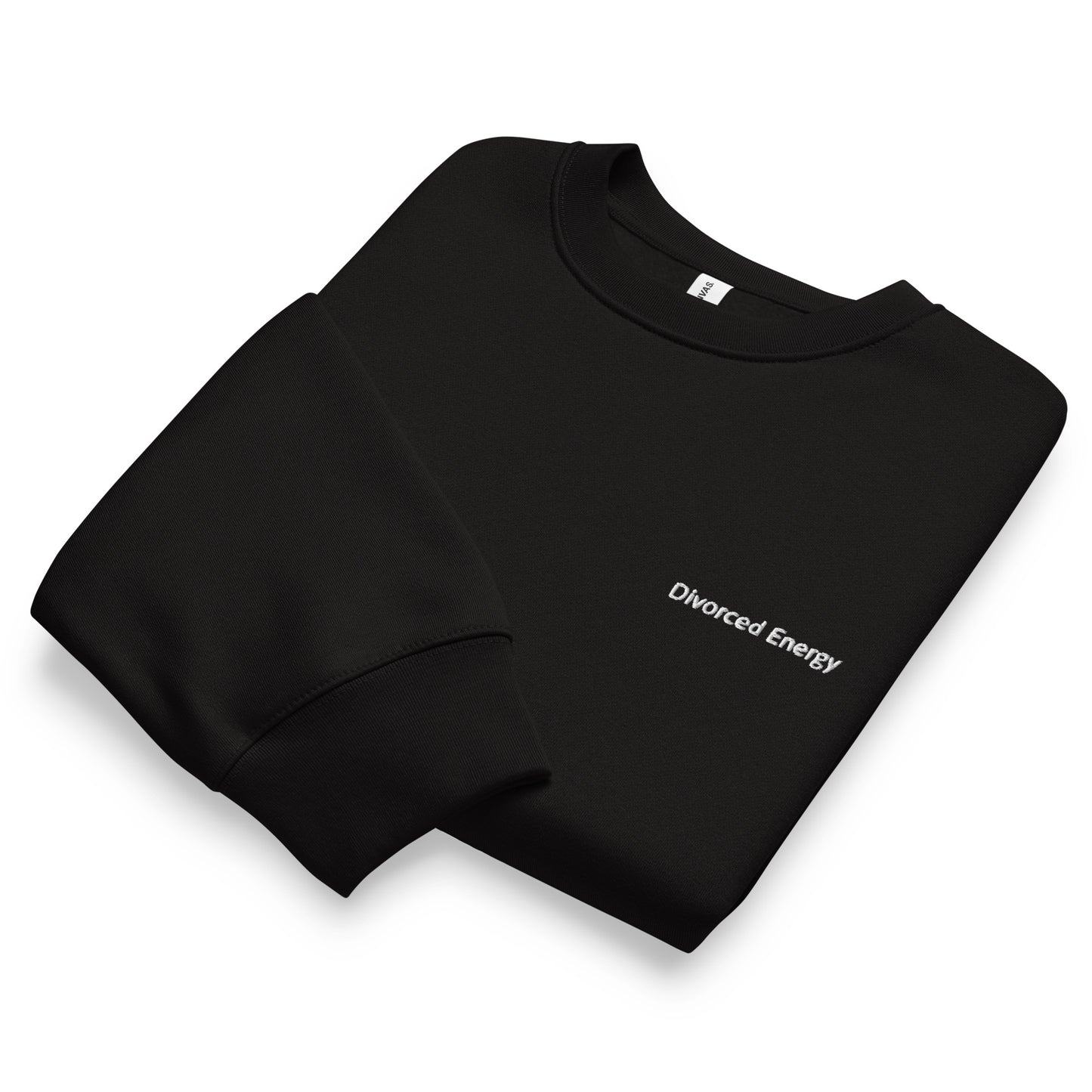 Black folded crewneck sweatshirt with 'Divorced Energy' embroidered in white on a white background
