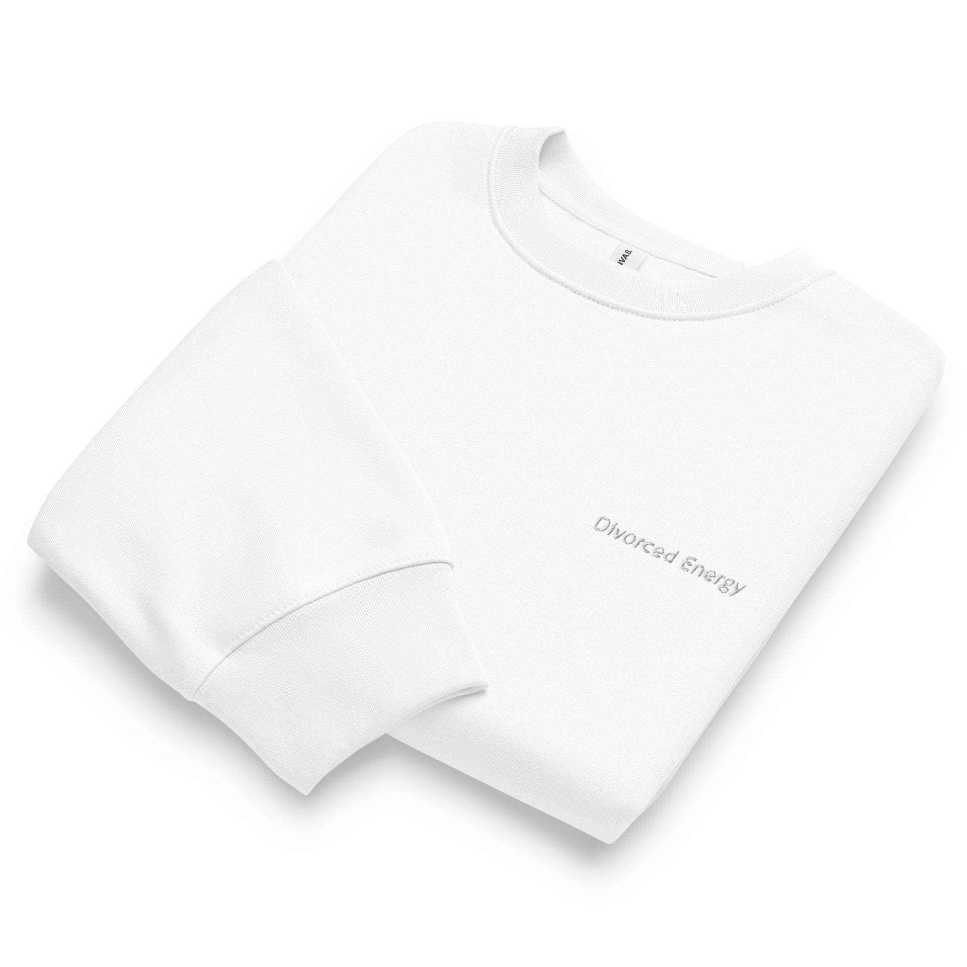 White folded crewneck sweatshirt with 'Divorced Energy' embroidered in white on a white background